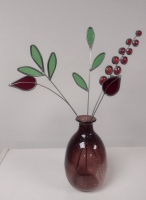 Vaas met bloemen rood paars
